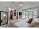 Bedroom with access to additional room and views to the balcony at 703 Cumberland Ne Cir, Atlanta, GA 30306
