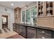 Modern kitchen with an island and stainless steel appliances, and hardwood floors at 703 Cumberland Ne Cir, Atlanta, GA 30306