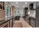 Modern kitchen with stainless steel appliances, custom cabinets and an island at 703 Cumberland Ne Cir, Atlanta, GA 30306