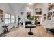 Bright and airy living room featuring a fireplace, hardwood floors, and abundant natural light at 703 Cumberland Ne Cir, Atlanta, GA 30306