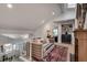 Bright upper-level living area with a comfortable daybed, built-in bookcase, and natural light at 703 Cumberland Ne Cir, Atlanta, GA 30306