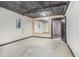 Unfinished basement ready to customize, showing utilities and access to other spaces at 206 Towler Dr, Loganville, GA 30052