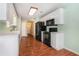 Efficient kitchen featuring white cabinets, modern appliances, and ample counter space at 206 Towler Dr, Loganville, GA 30052