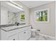 Bathroom featuring granite counters and modern fixtures at 2617 Peggy Sue Ln, Morrow, GA 30260