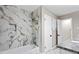 The bathroom features marble tile and granite countertops at 2617 Peggy Sue Ln, Morrow, GA 30260
