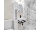 Bathroom boasts modern fixtures and a marble tiled shower at 2617 Peggy Sue Ln, Morrow, GA 30260
