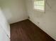 View of a spare bedroom featuring linoleum floors and minimal wall damage at 6344 Fitzgerald Ln, Austell, GA 30168