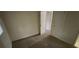 Bedroom featuring wall-to-wall carpeting and basic features with two doors at 6344 Fitzgerald Ln, Austell, GA 30168