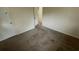 Bedroom featuring wall-to-wall carpeting and basic features with two doors at 6344 Fitzgerald Ln, Austell, GA 30168