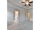 Bedroom with doors leading to bathroom and closet areas, neutral paint and carpet at 1431 Winding Ridge Trl, Buford, GA 30548