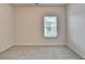 Neutral bedroom with plush carpet and natural light at 1431 Winding Ridge Trl, Buford, GA 30548