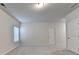 Bedroom featuring carpeted floor, neutral walls, and a bright window at 1431 Winding Ridge Trl, Buford, GA 30548