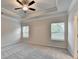 Spacious main bedroom featuring plush carpet, neutral walls, and ample natural light from two windows at 1431 Winding Ridge Trl, Buford, GA 30548