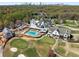 A stunning aerial view of a recreational facility with a pool, golf course, and clubhouse at 200 Heaton Park Dr, Decatur, GA 30030