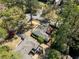 Aerial view of property, showing backyard deck, landscaping, surrounding streets, and neighborhood at 200 Heaton Park Dr, Decatur, GA 30030