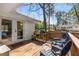 Inviting back deck with outdoor seating, a grilling area, and access to the backyard, ideal for entertaining at 200 Heaton Park Dr, Decatur, GA 30030