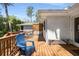 Spacious back deck with a charming blue chair, perfect for enjoying the outdoors and neighborhood views at 200 Heaton Park Dr, Decatur, GA 30030