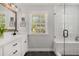 Bright bathroom featuring double vanity, walk in shower and natural light at 200 Heaton Park Dr, Decatur, GA 30030
