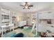 Bright ' bedroom with bunk beds, a desk area, and a colorful rug, perfect for play and study at 200 Heaton Park Dr, Decatur, GA 30030