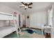 Cozy ' room featuring bunk beds, ample closet space, and a playful rug, creating a fun environment at 200 Heaton Park Dr, Decatur, GA 30030