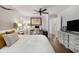 Sun-filled bedroom featuring hardwood floors, work space and soft, neutral colors at 200 Heaton Park Dr, Decatur, GA 30030