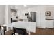 Charming eat-in kitchen features stainless steel appliances, white cabinets, and marble countertops at 200 Heaton Park Dr, Decatur, GA 30030