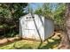Exterior view of the backyard storage shed, offering practical storage space at 200 Heaton Park Dr, Decatur, GA 30030