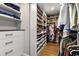 Walk-in closet features custom shelving and storage for clothes and shoes at 200 Heaton Park Dr, Decatur, GA 30030