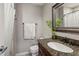 The bathroom features granite countertops, a spacious vanity, and modern fixtures at 2016 River Heights Se Walk, Marietta, GA 30067