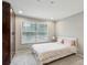 This bright bedroom has a light neutral color and ample closet space at 2016 River Heights Se Walk, Marietta, GA 30067