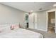 Relax in this serene bedroom with an attached en suite bathroom and lots of natural light at 2016 River Heights Se Walk, Marietta, GA 30067