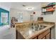 The kitchen has granite countertops and updated appliances, making it a chef's dream at 2016 River Heights Se Walk, Marietta, GA 30067