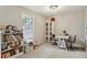 Small space with bookshelf and decorations by a window at 2016 River Heights Se Walk, Marietta, GA 30067