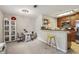 Open living and kitchen area with bar-style counter seating at 2016 River Heights Se Walk, Marietta, GA 30067