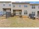 Backyard view of a home with a small deck and access to the yard at 331 Parkview Manor Dr, Tucker, GA 30084