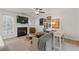Bright living room offers a fireplace and stylish decor with easy access to the kitchen at 331 Parkview Manor Dr, Tucker, GA 30084