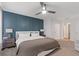Cozy main bedroom featuring a decorative wall and modern bedside lamps at 331 Parkview Manor Dr, Tucker, GA 30084