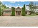 Community clubhouse with brick accents and a well-maintained exterior, near a paved parking area at 3360 Camellia Ln, Suwanee, GA 30024