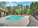 Community pool surrounded by a patio, lounge chairs, and fencing creating a relaxing outdoor space at 3360 Camellia Ln, Suwanee, GA 30024
