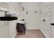 This walk-in closet features wire shelving, hanging rods, and beige carpet at 3360 Camellia Ln, Suwanee, GA 30024