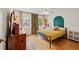 Bright bedroom with natural light, wooden floors, and a charming accent wall at 1380 Chalmette Ne Dr # 3, Atlanta, GA 30306
