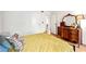Bedroom featuring a vintage dresser, ornate mirror, and doorway to an adjacent room at 1380 Chalmette Ne Dr # 3, Atlanta, GA 30306