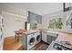 Spacious eat-in kitchen featuring butcher block countertops and a farmhouse sink at 1380 Chalmette Ne Dr # 3, Atlanta, GA 30306