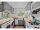 Charming kitchen with butcher block countertops, white subway tile, and a farmhouse sink at 1380 Chalmette Ne Dr # 3, Atlanta, GA 30306