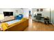 Open-concept living space with hardwood floors, stylish furniture, and a dedicated office area at 1380 Chalmette Ne Dr # 3, Atlanta, GA 30306
