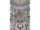 Grand foyer features tile flooring, glass exterior and decorative chandelier at 325 E Paces Ferry Ne Rd # 410, Atlanta, GA 30305