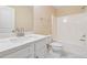 Clean bathroom featuring a vanity with marble countertop and a shower-tub combo at 3892 Trillium Wood Trl, Snellville, GA 30039