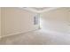 Bedroom featuring plush carpet and a bright window at 3892 Trillium Wood Trl, Snellville, GA 30039