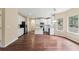 Eat-in kitchen with white cabinetry, stainless steel appliances, and a center island at 3892 Trillium Wood Trl, Snellville, GA 30039
