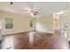 Inviting living room with hardwood floors, fireplace, and plenty of natural light at 3892 Trillium Wood Trl, Snellville, GA 30039